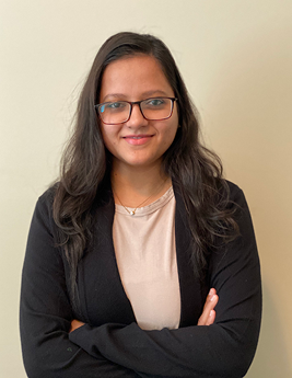Headshot of Riya Dalal (Elle)